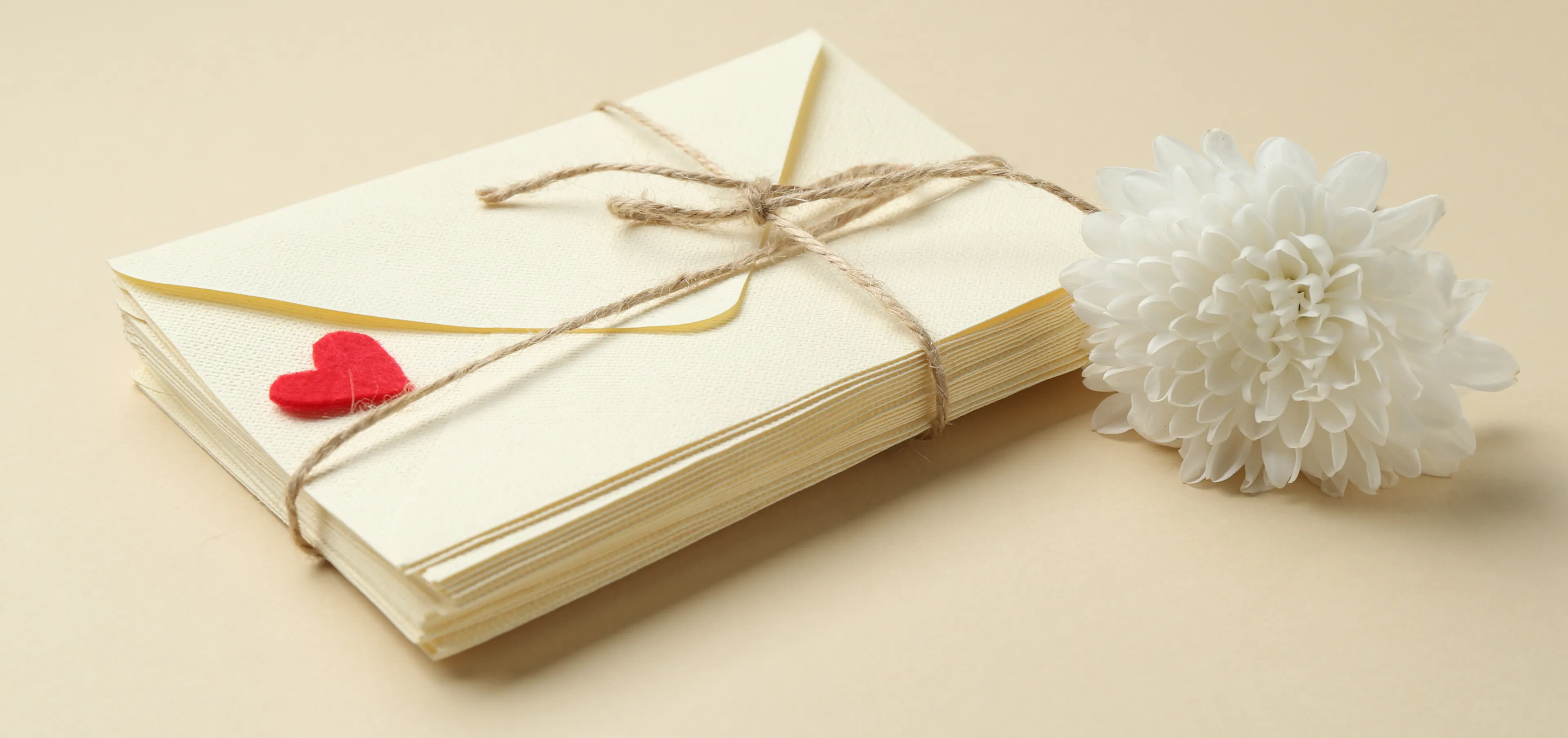 Bundle of handwritten open when letters tied with twine, a long-distance relationship gift to open over time