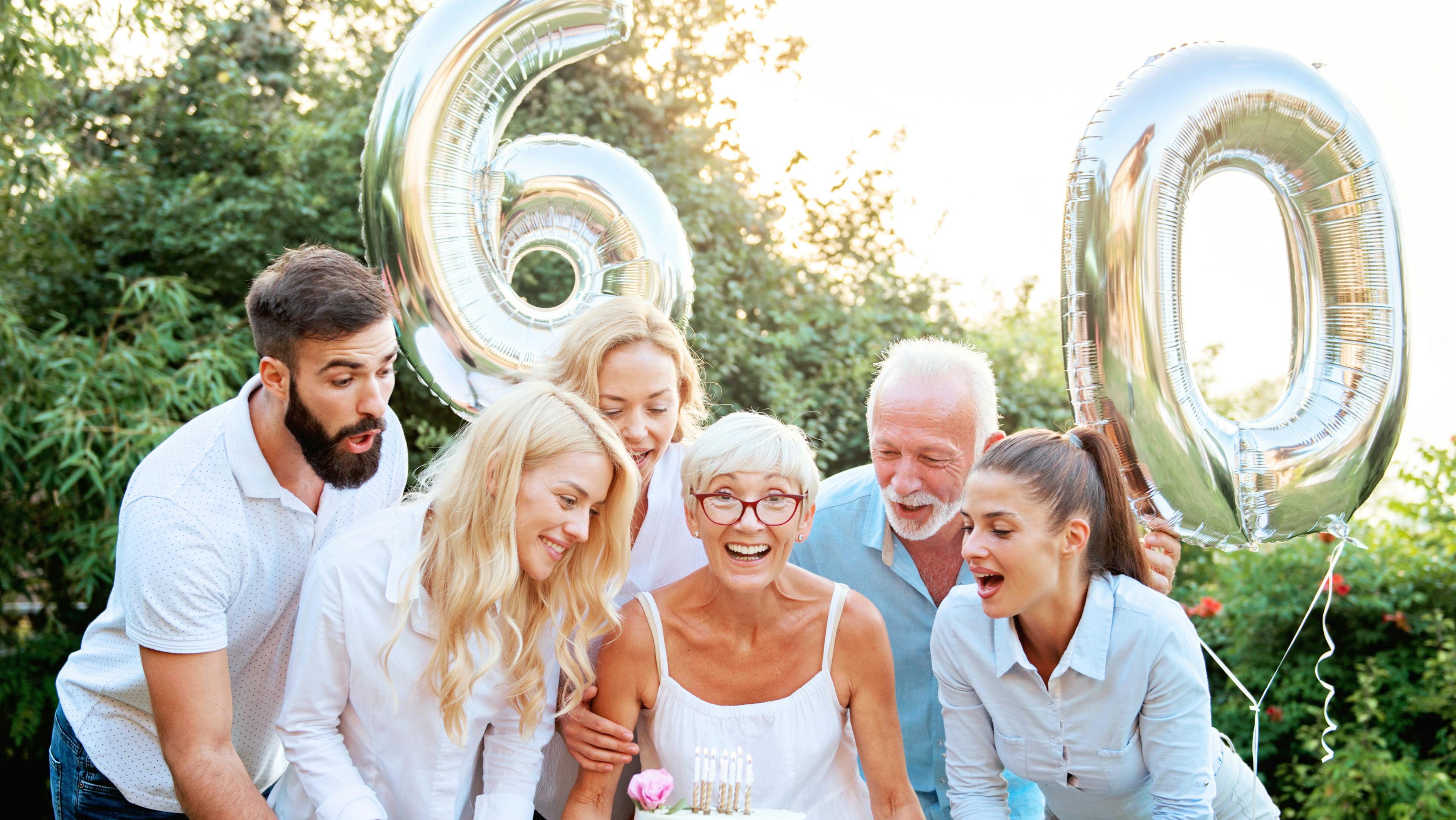 Family and friends celebrating milestone 60th birthday, by Woxbox Gift