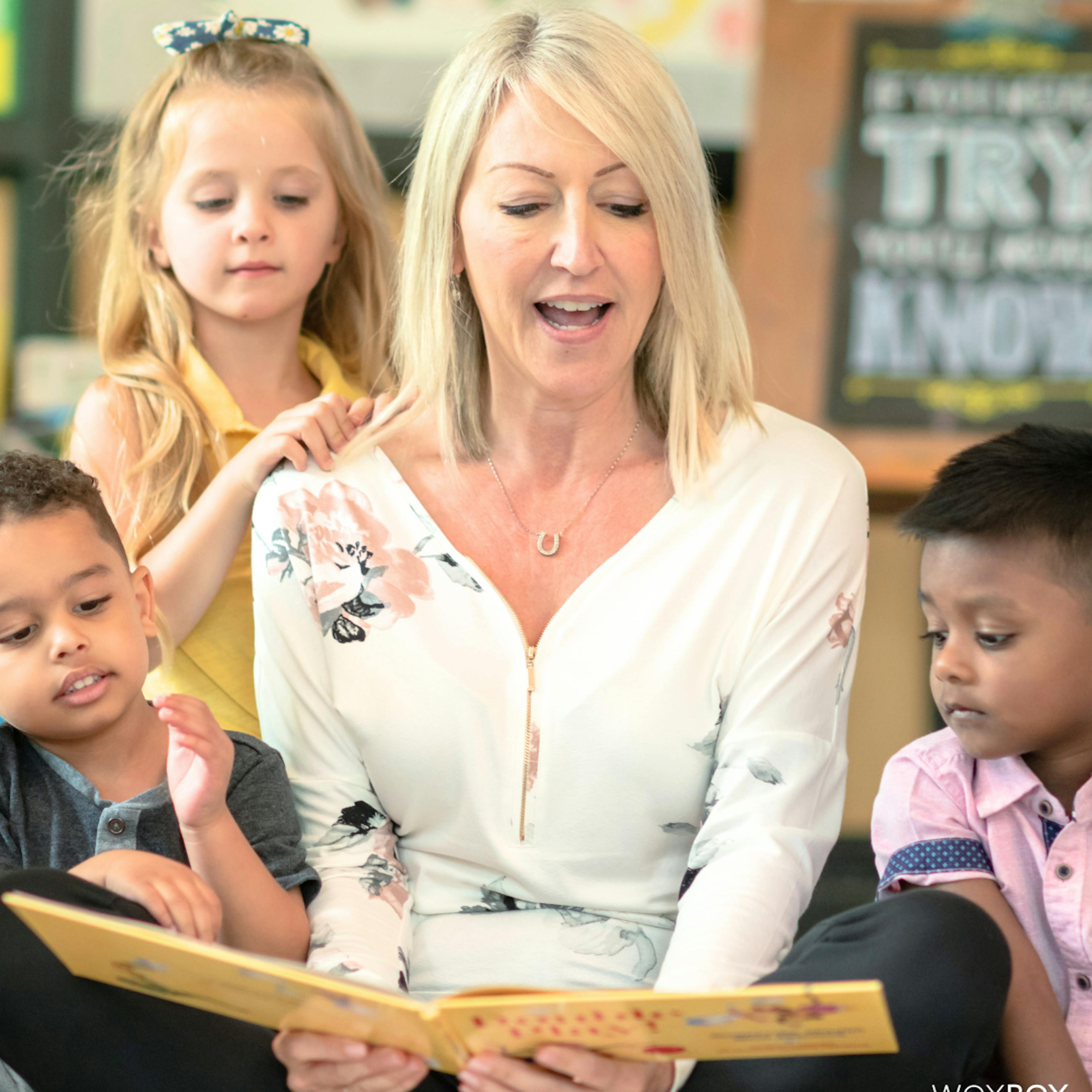 Teacher reading to her students 