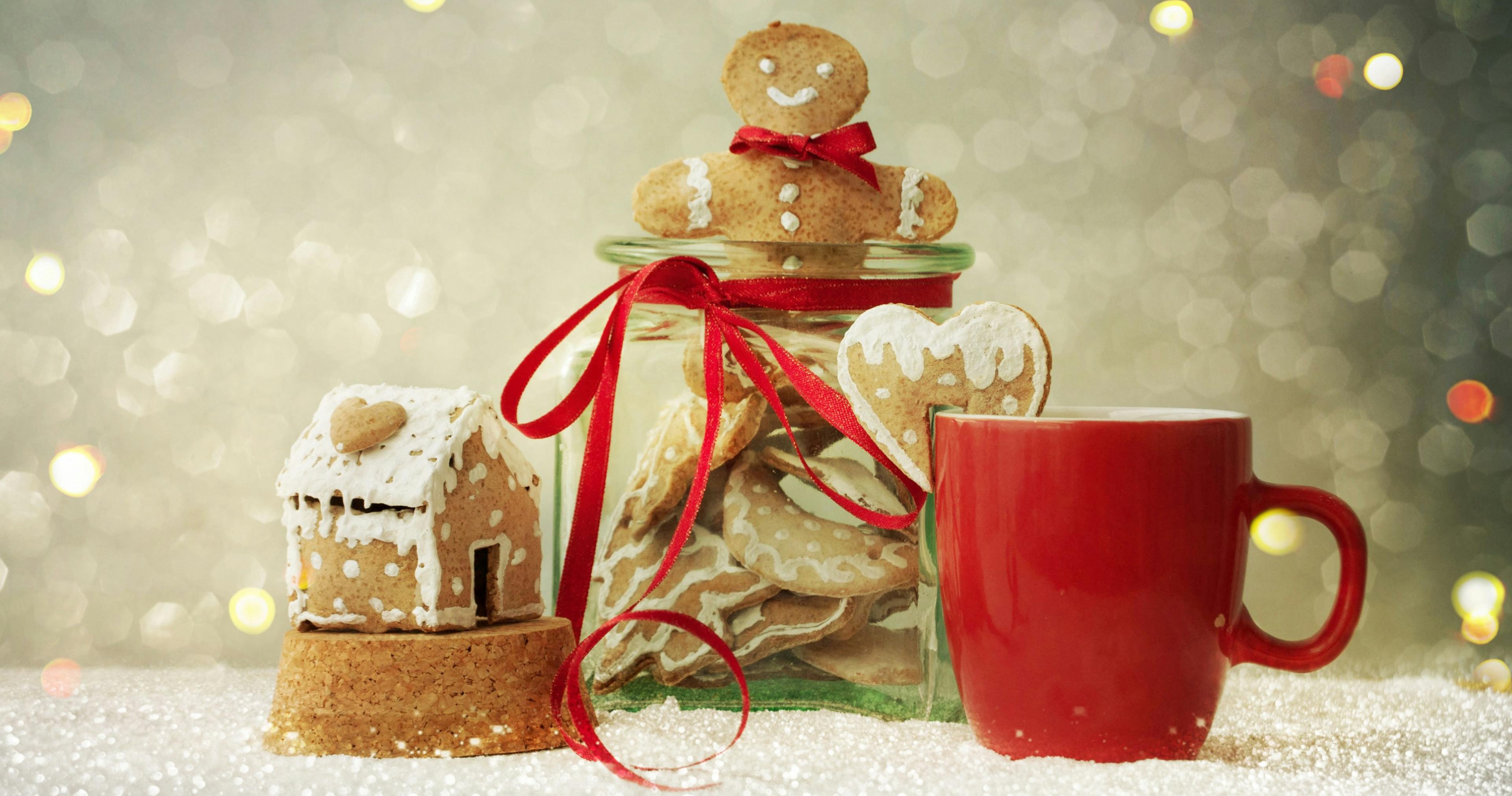 Christmas tradition of hot chocolate, gingerbread man and gingerbread house