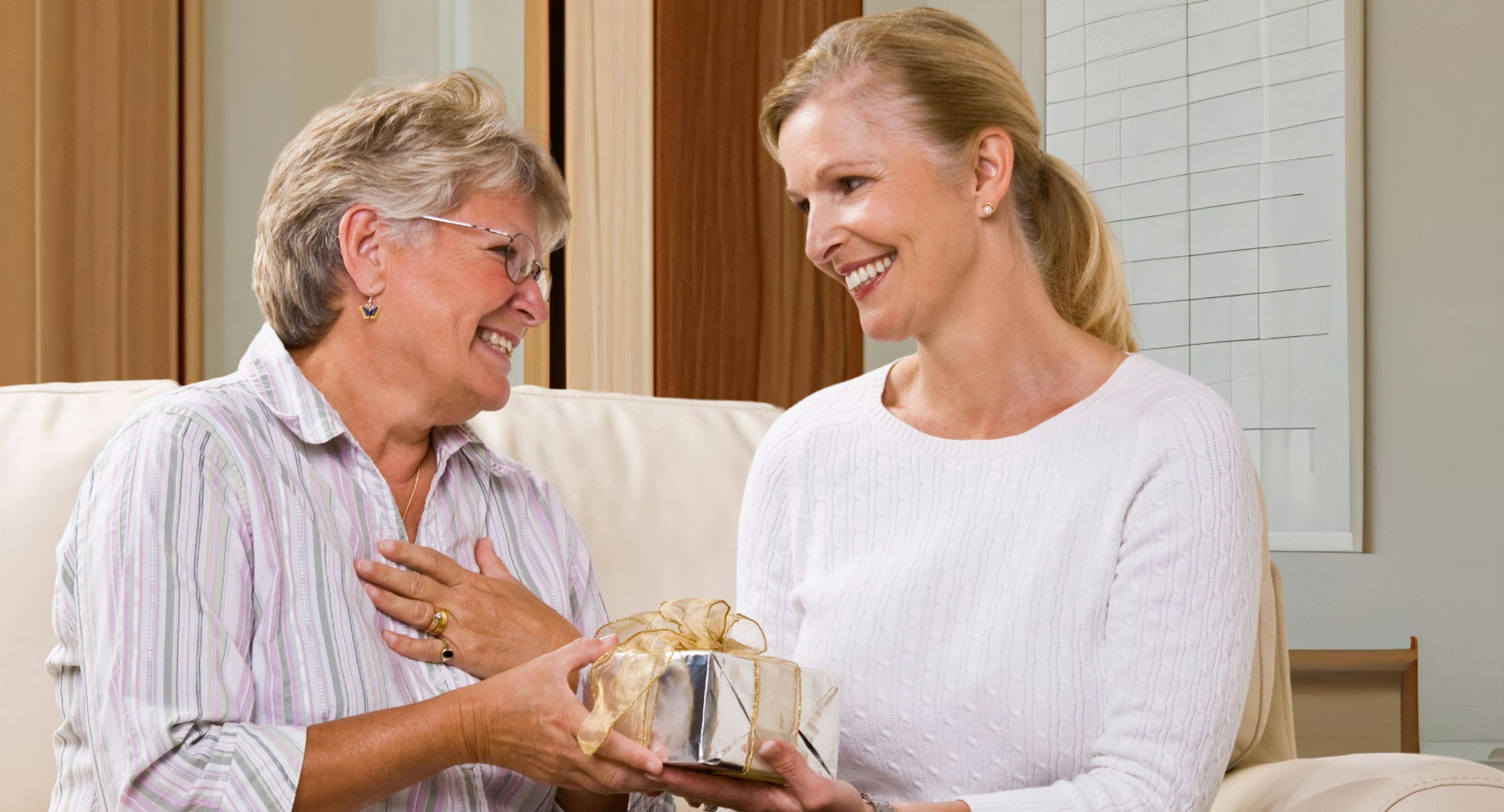 Daughter giving a last-minute gift for Mom