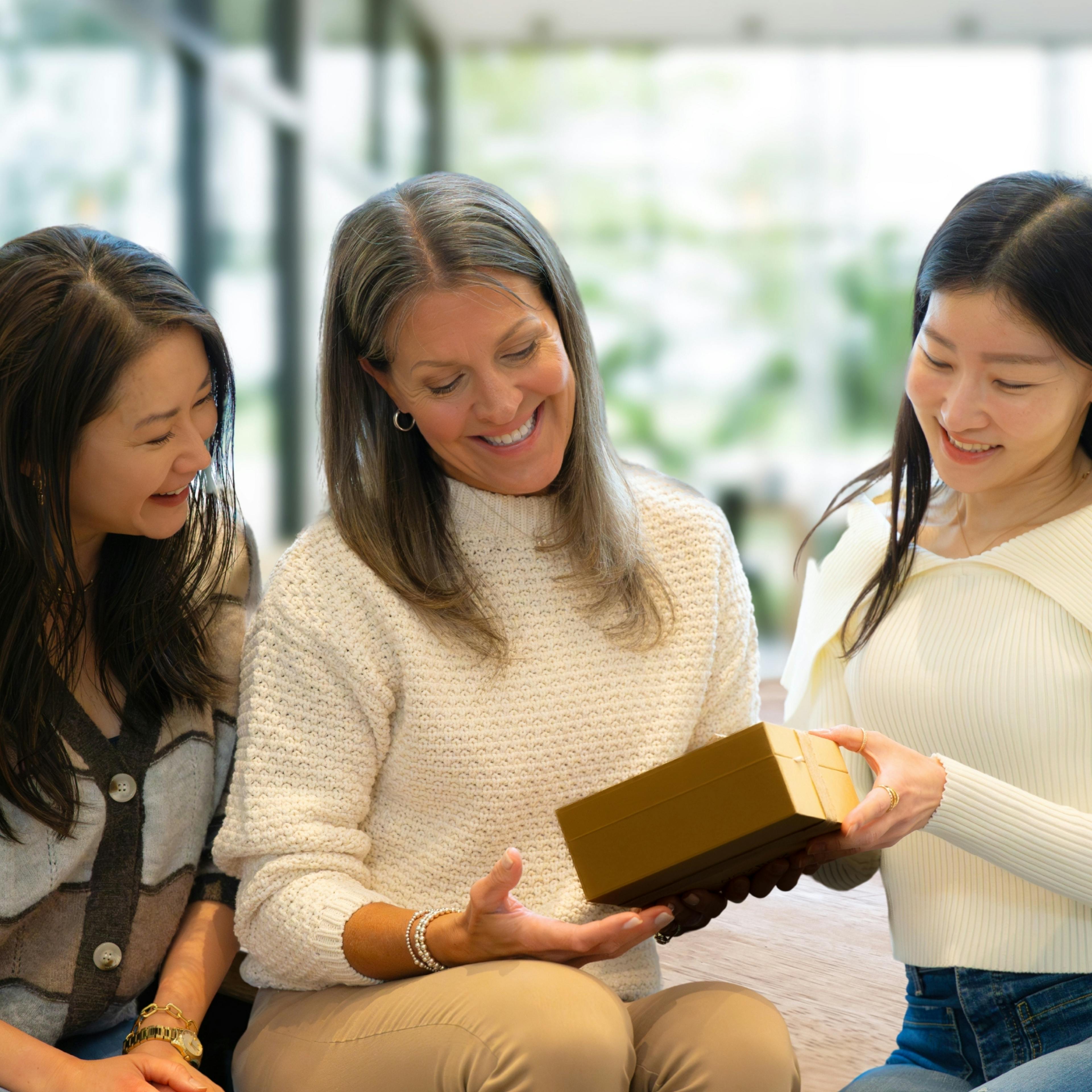 Friends giving a meaningful group gift