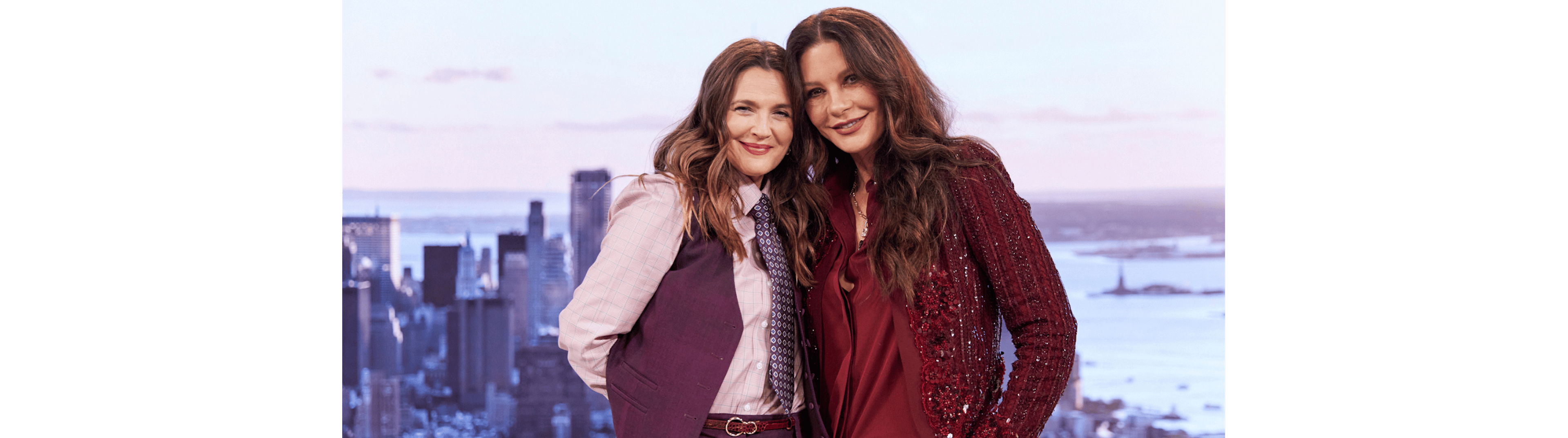 Drew Barrymore and Catherine Zeta Jones on the Drew Barrymore Show giving each other a hug