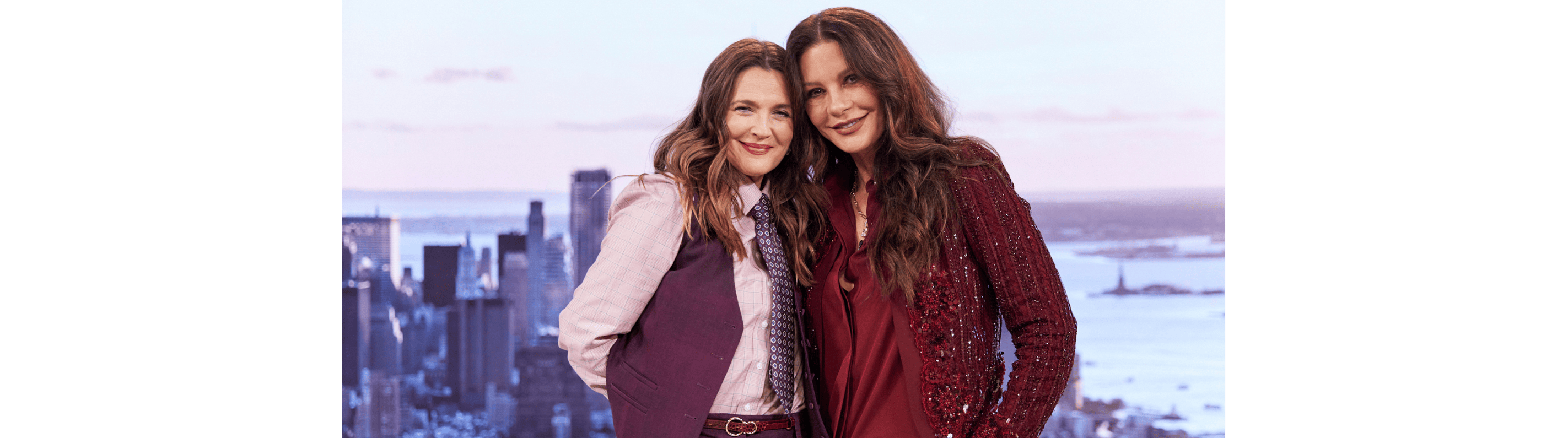 Drew Barrymore and Catherine Zeta Jones on the Drew Barrymore Show giving each other a hug