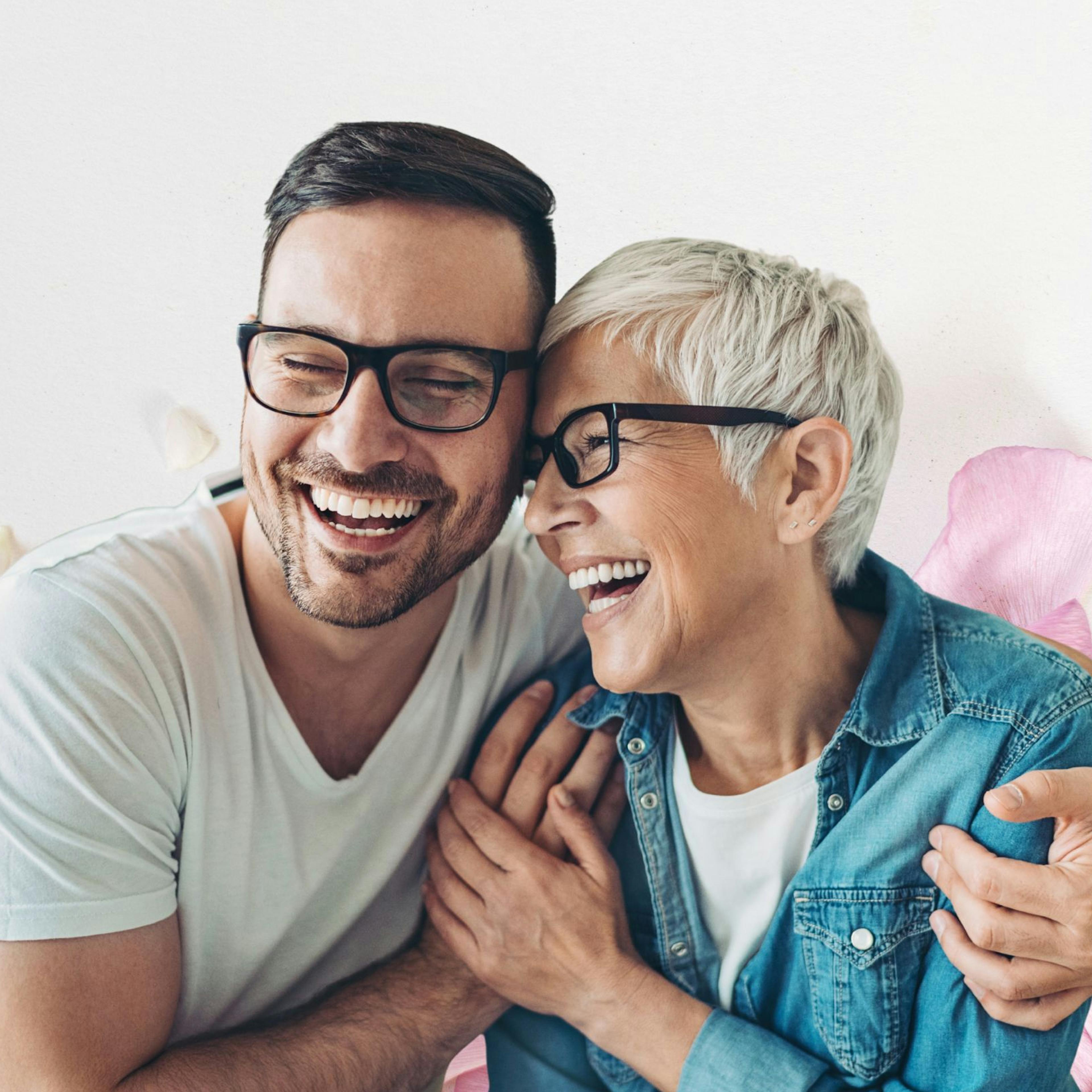 Mother and Son hugging and laughing together on Mother's Day
