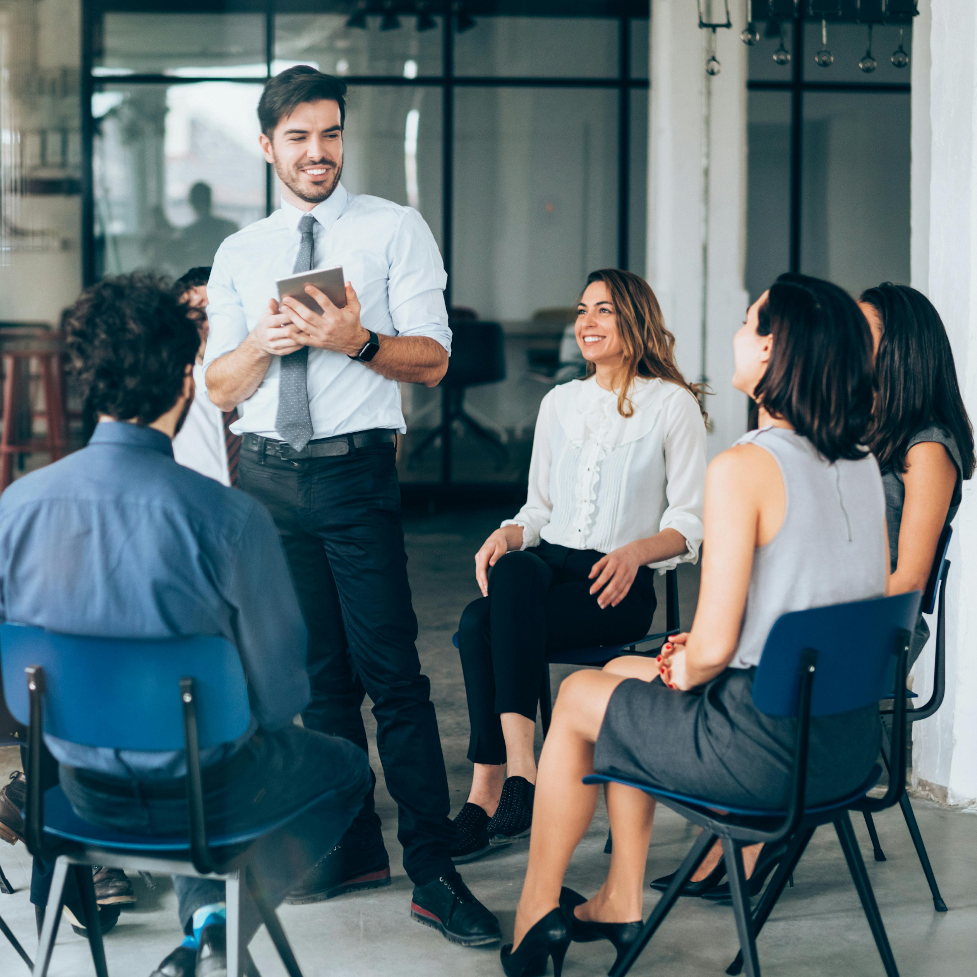 Team members sharing appreciation and kind words in a workplace environment