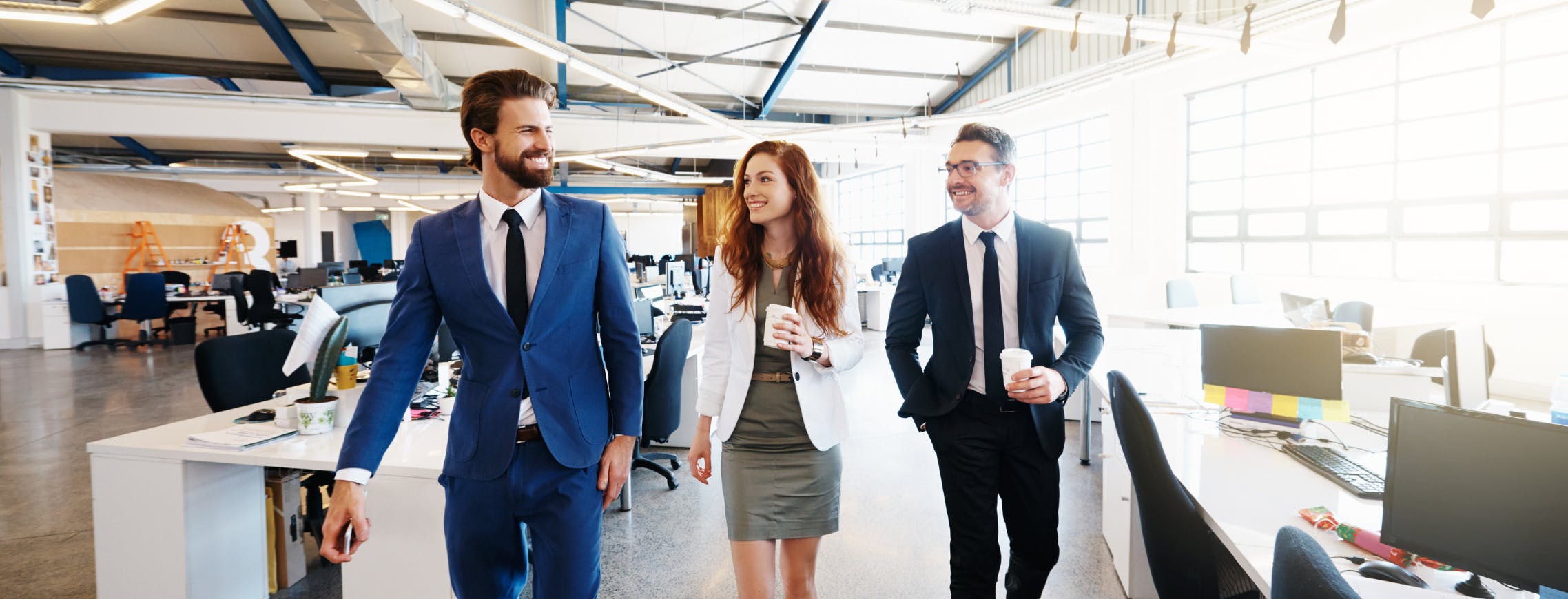 Colleagues discussing a corporate farewell gift