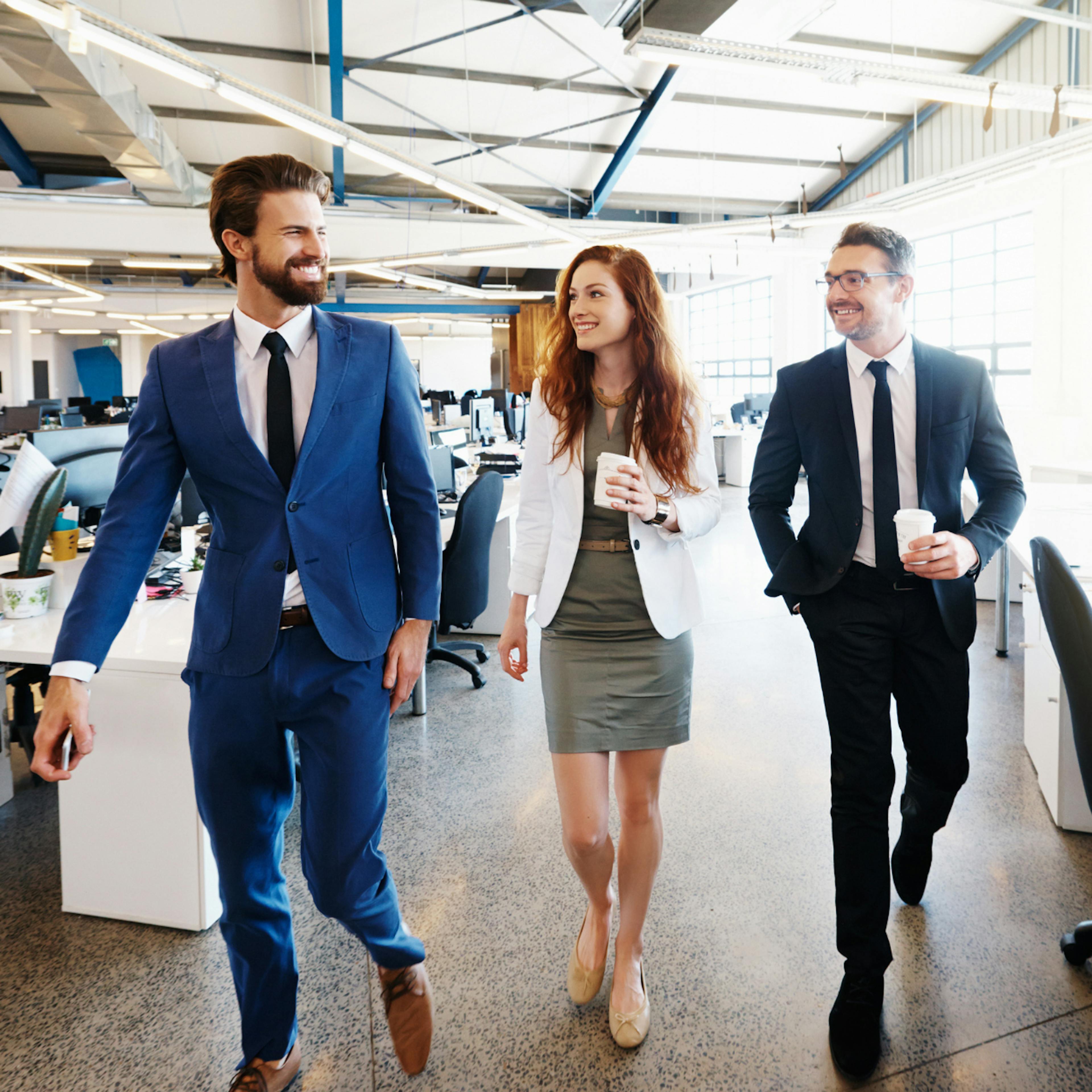 Colleagues discussing a corporate farewell gift