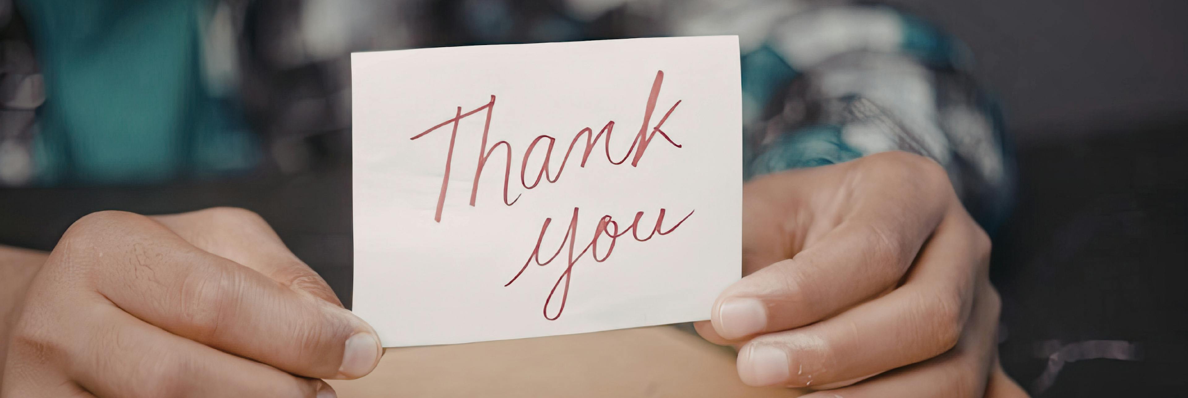 A heartfelt thank you note, representing appreciation shown to an unsung hero in your life