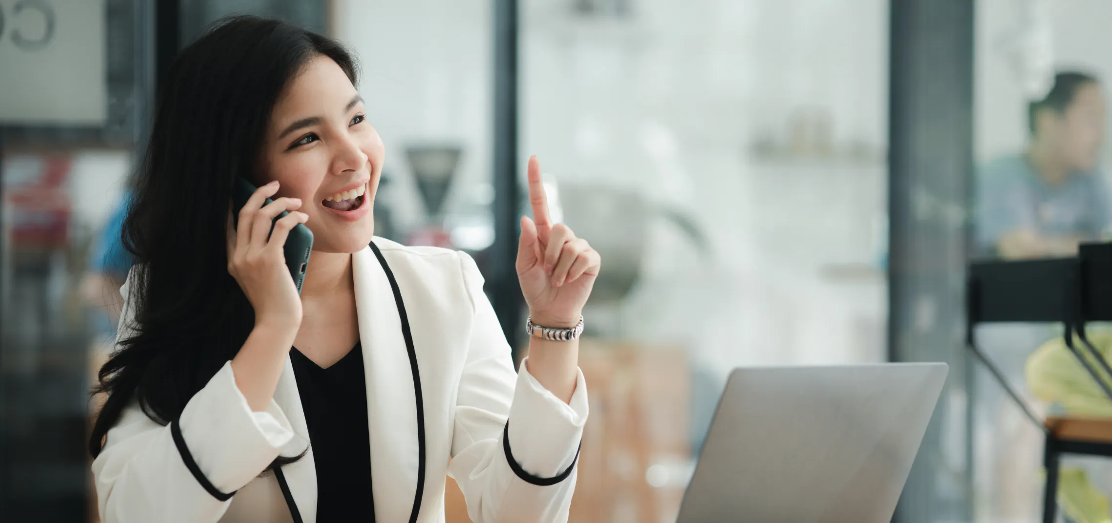 Executive assistant planning workplace appreciation and kindness while smiling in modern office