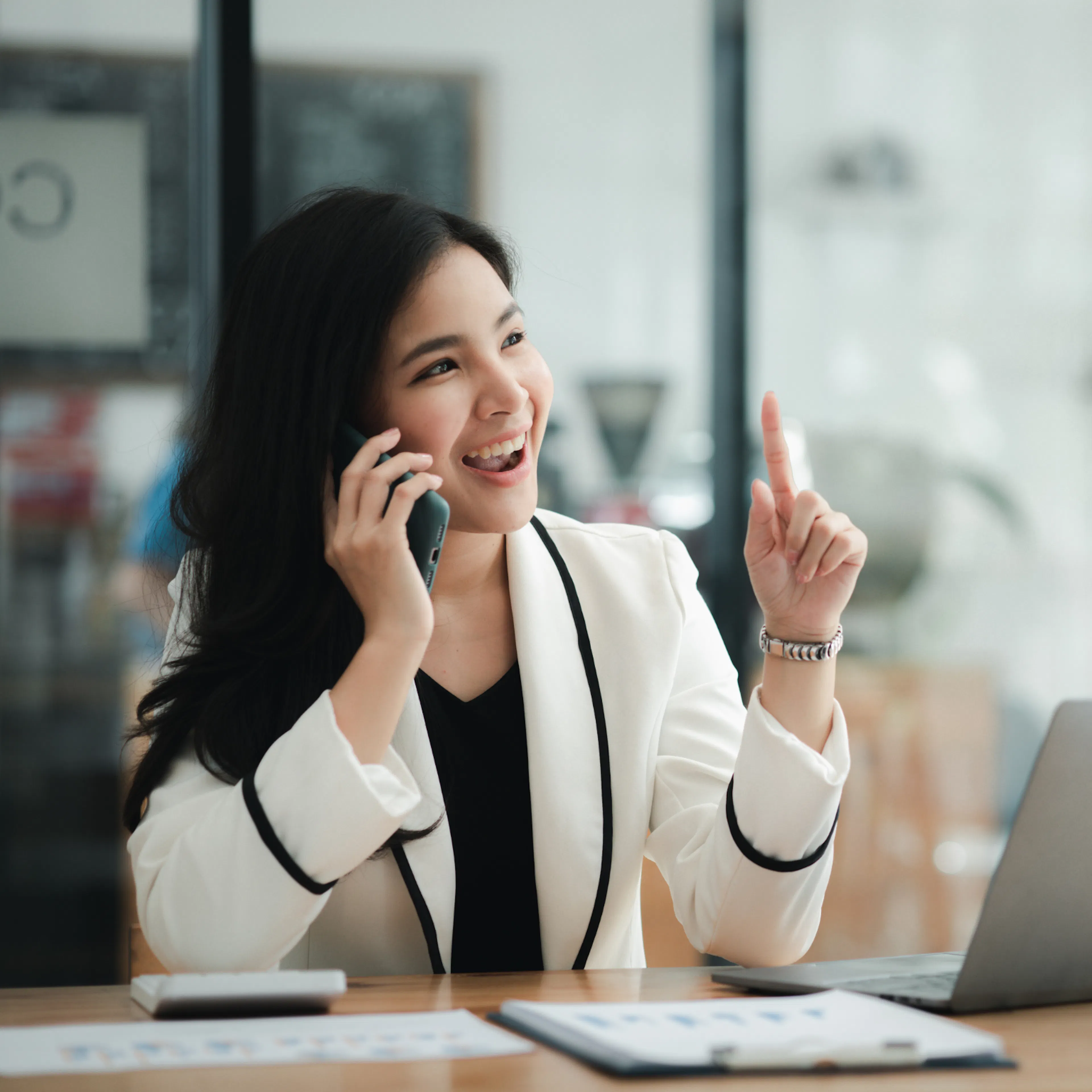 Executive assistant planning workplace appreciation and kindness while smiling in modern office