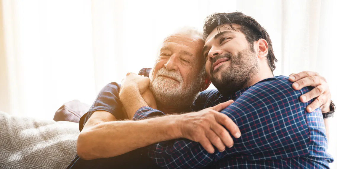 Father and son hugging on Father's Day, representing time together as the greatest gift of all