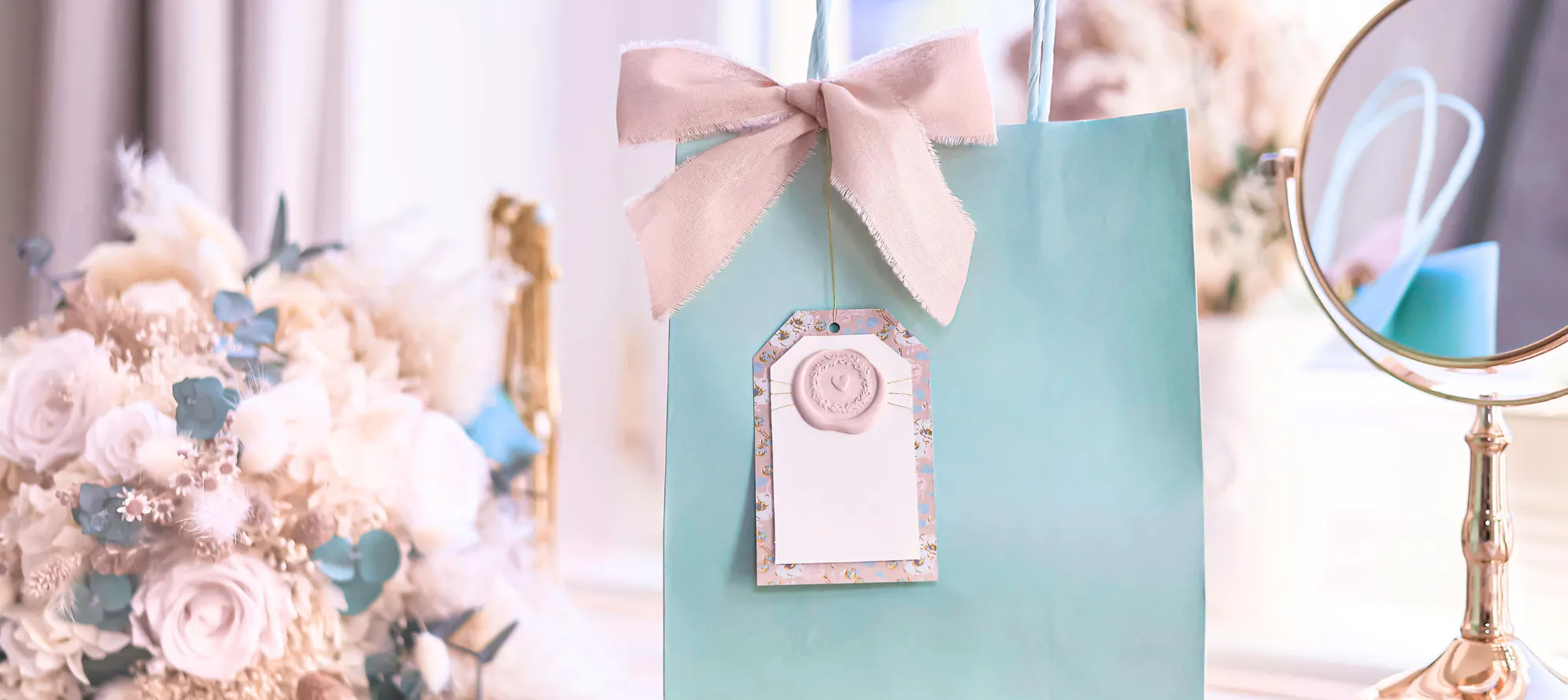 Beautiful wedding gift wrapped in pink and blue, representing thoughtful gift-giving