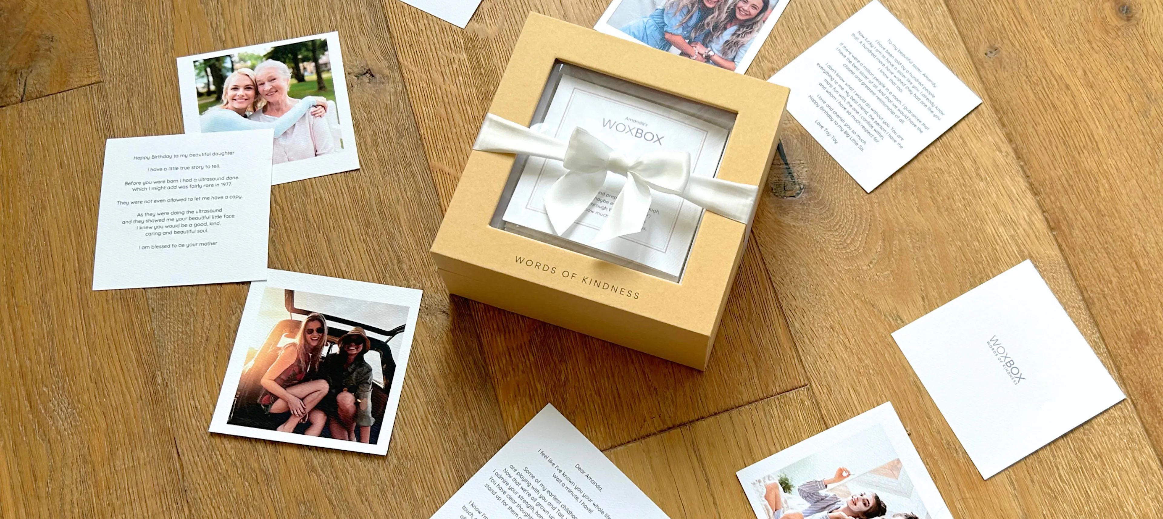 A keepsake Woxbox gift box wrapped in a satin bow, along with photos and words of kindness messages around it