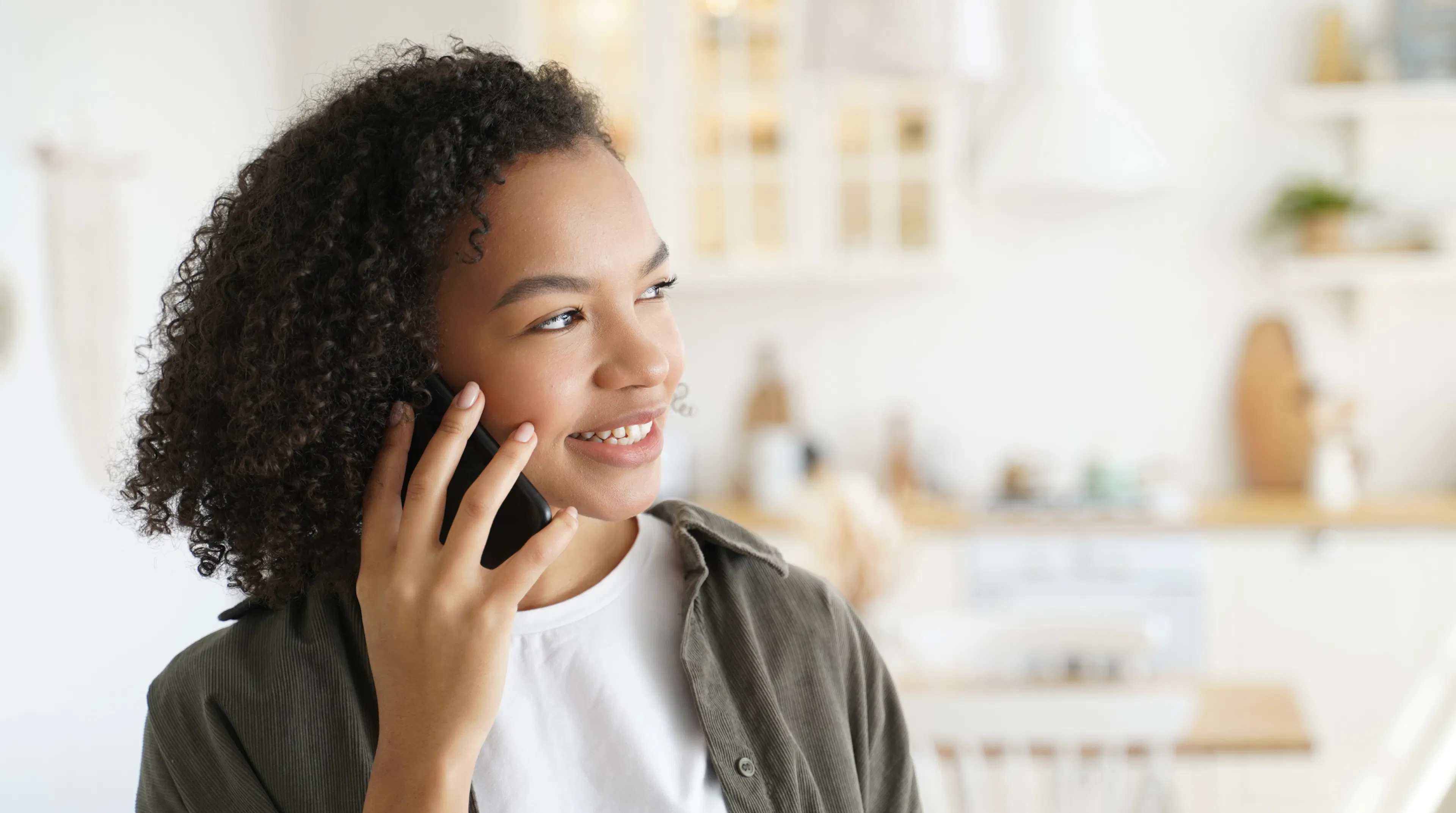 Woman on her mobile phone calling her sibling