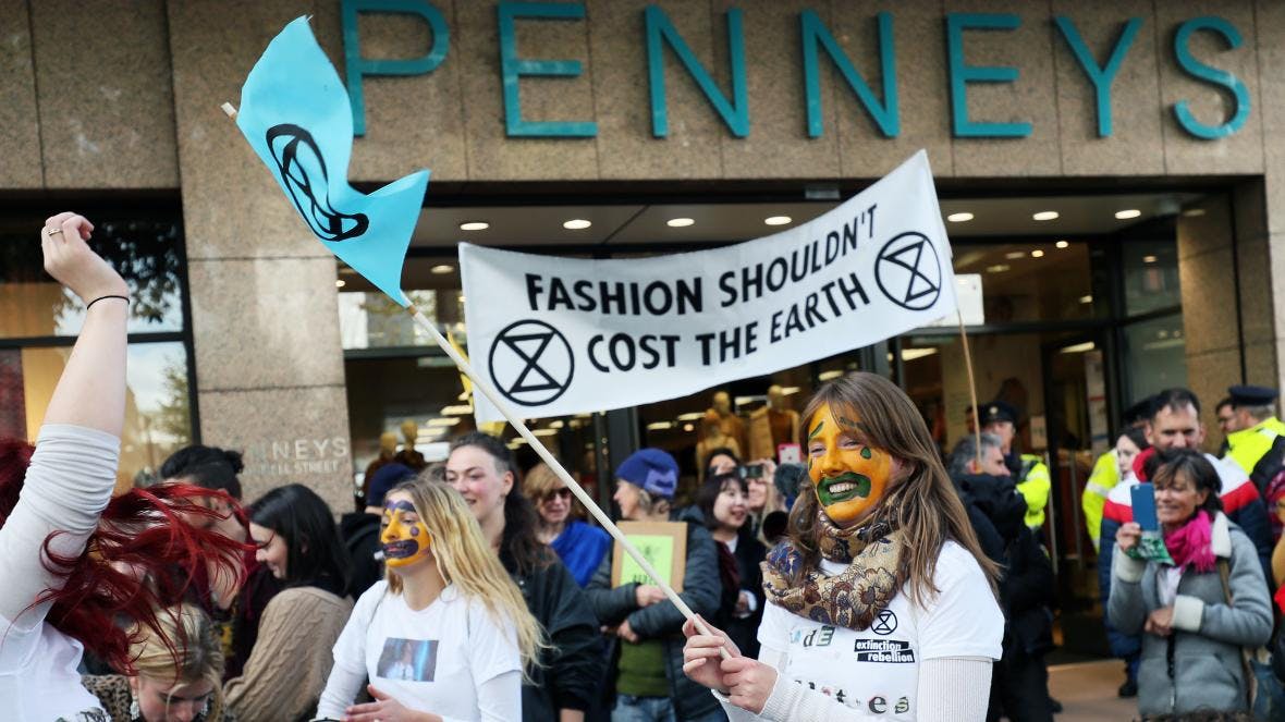 Extinction rebellion takes on fast fashion in Dublin, Ireland. Photograph by Brian Lawless/PA