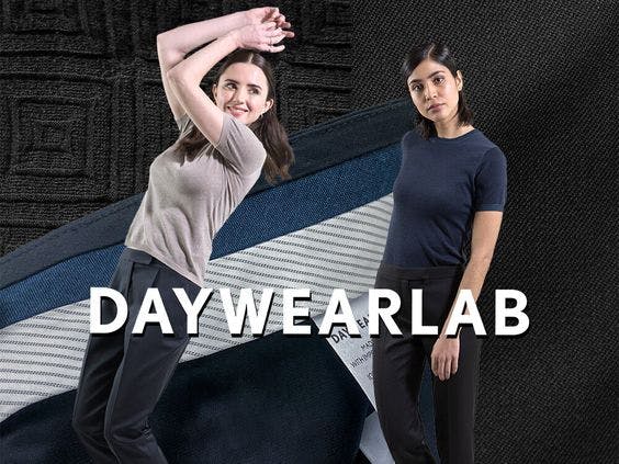 Two women model with the text "Day Wear Lab"