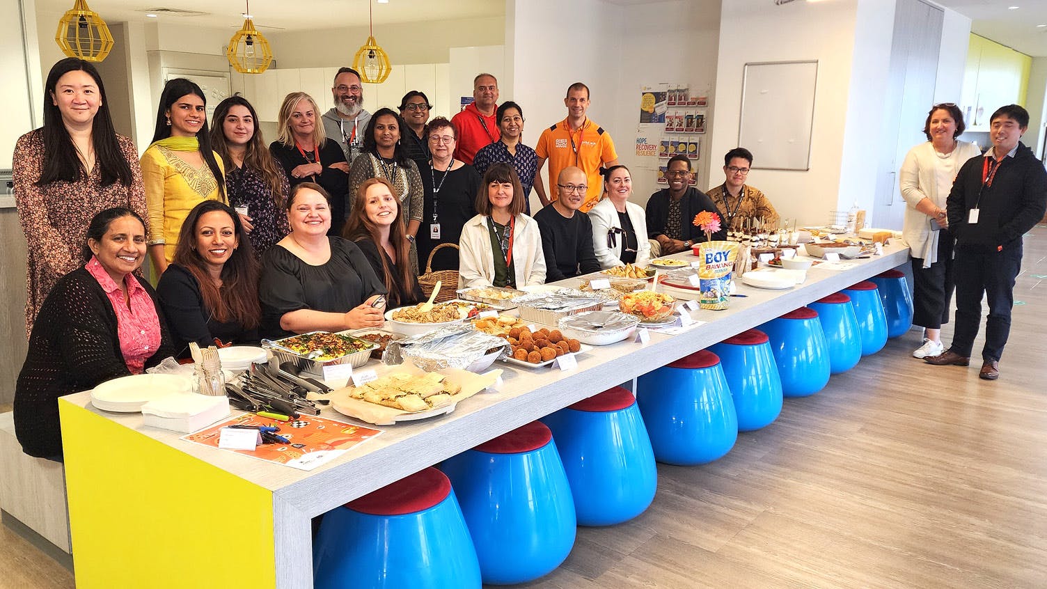 A group of employees enjoying a meal together