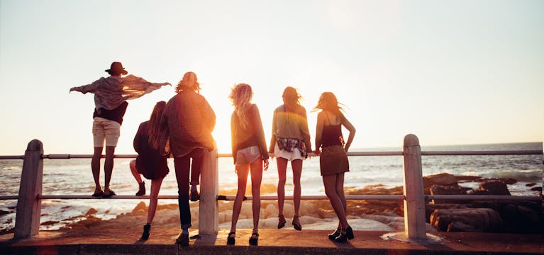 Teenagers on a beach holiday.