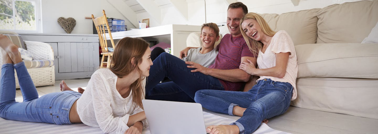 Family with teenagers planning a holiday.