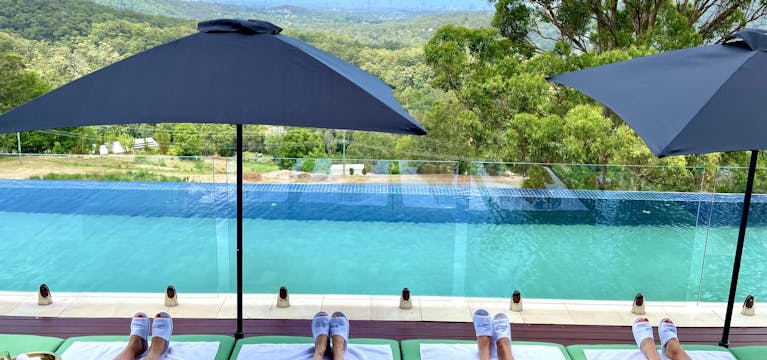 Girls by the pool at On Eagle Wings Mountain Retreat and Spa, Queensland.