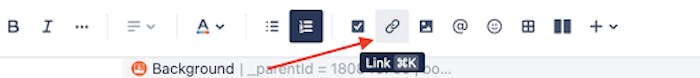 A toolbar in Confluence with an arrow pointing towards the link button
