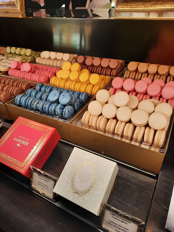 Display of colorful macarons inside Laduree at the National Trust Papers III press event.
