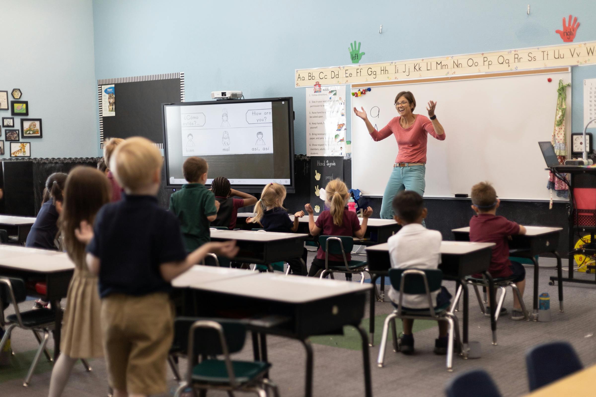 Teacher in front of classroom