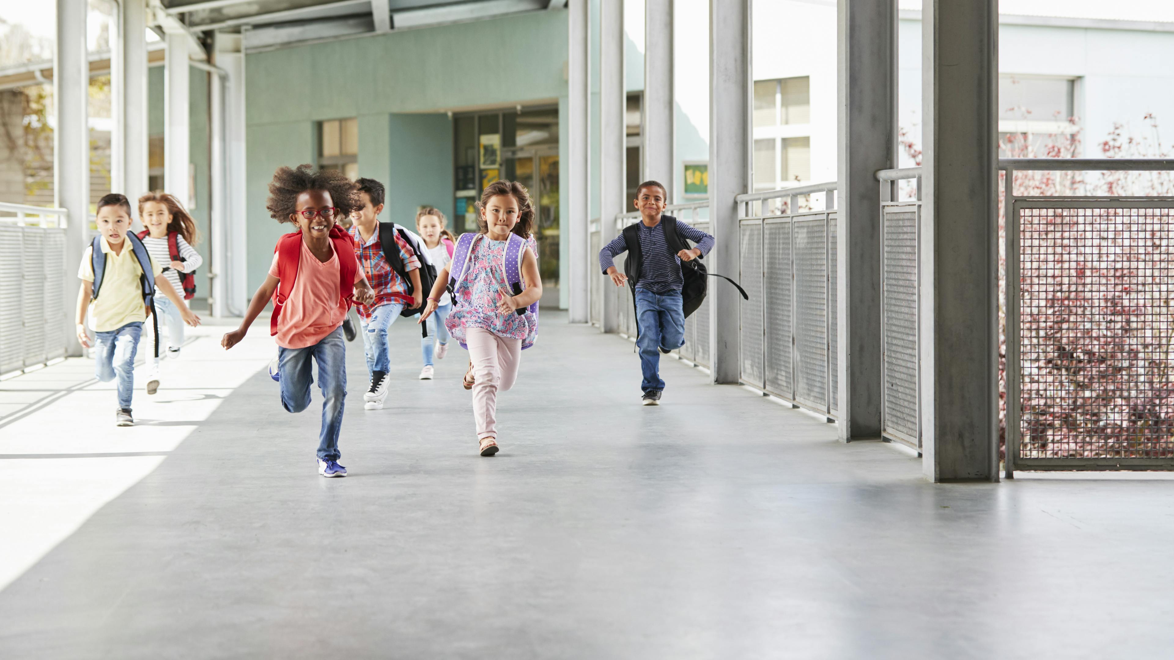 Kids running in school