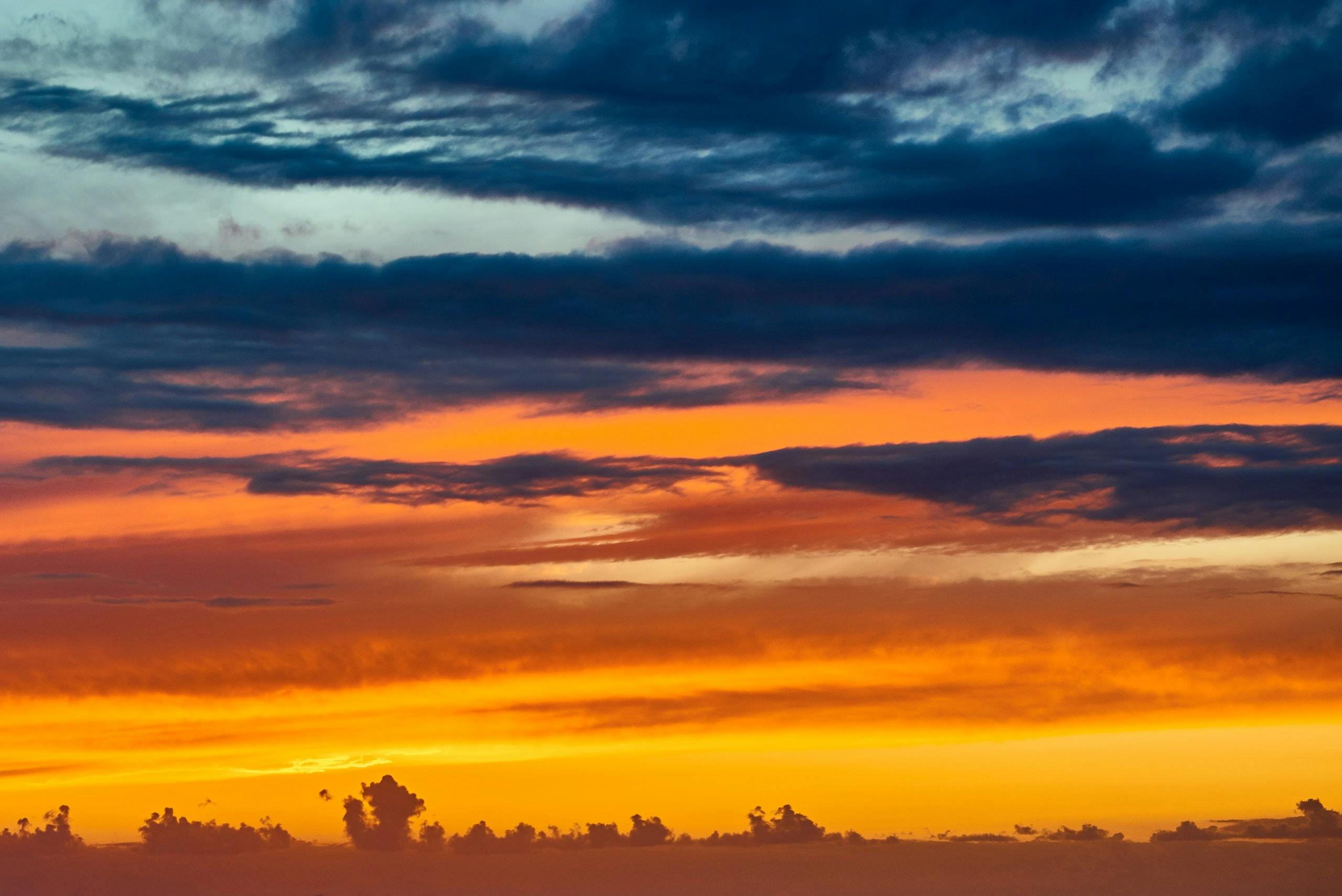 Beautiful multi-colored sky palette over the Galicia coast. Photography by Xavier Wendling.