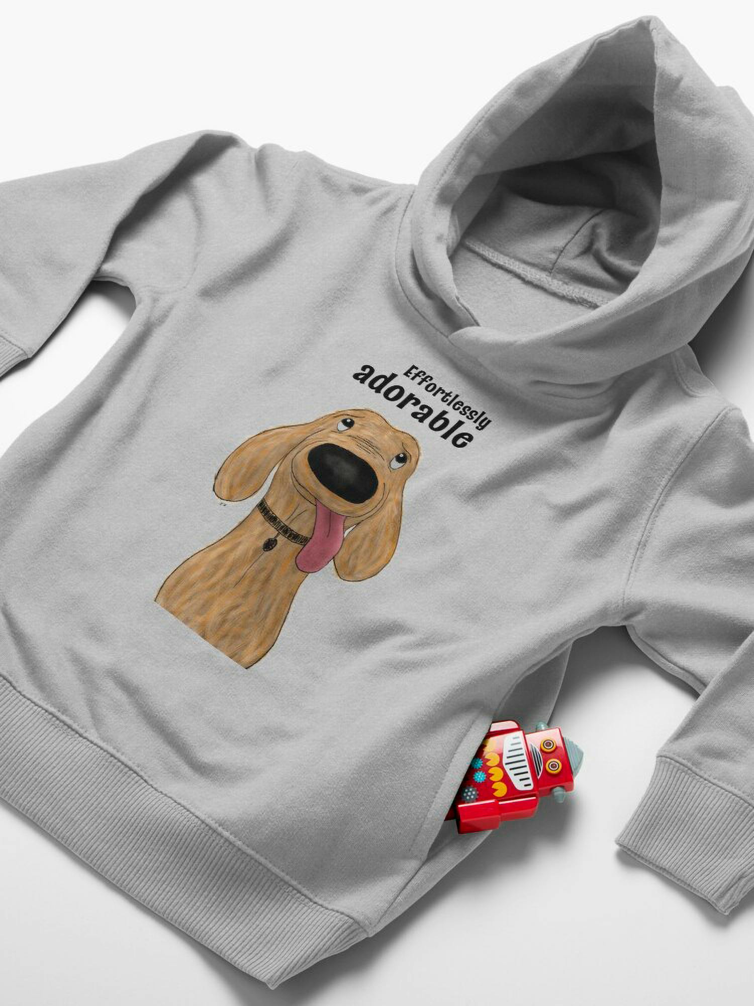 Effortlessly adorable cartoon dog toddler hoodie by Xavier Wendling available on RedBubble.