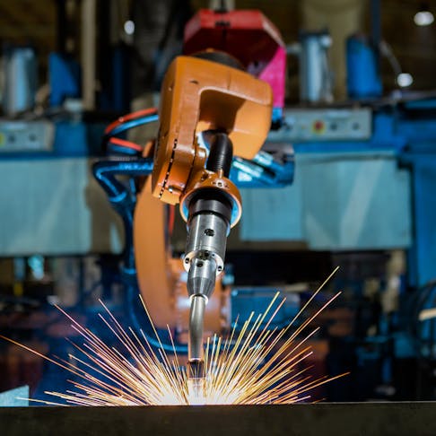Robotic arm welding. Image Credit: Shutterstock.com/Factory_Easy