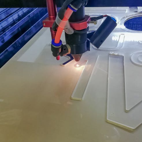 Laser cutting acrylic. Image Credit: Shutterstock.com/Openkomax