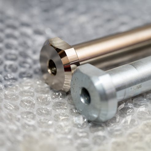 Electroless nickel plated motorcycle axle shaft. Image Credit: Shutterstock.com/TSUKASA HASEGAWA