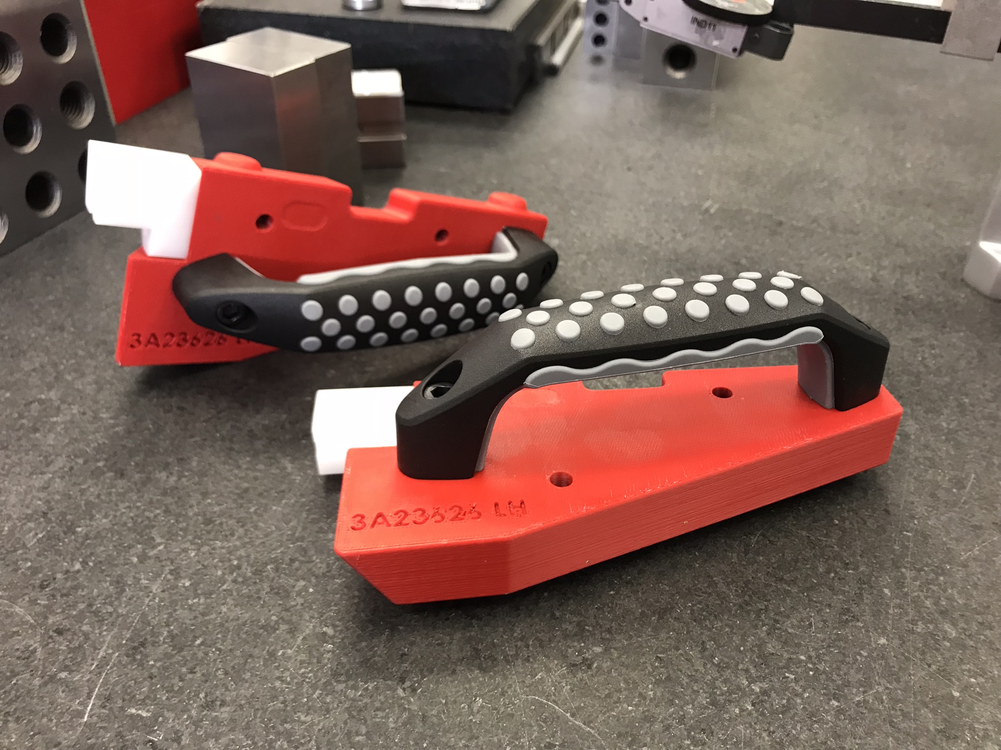 3D printed FDM jig in ABS-M30 red with COTS handle
