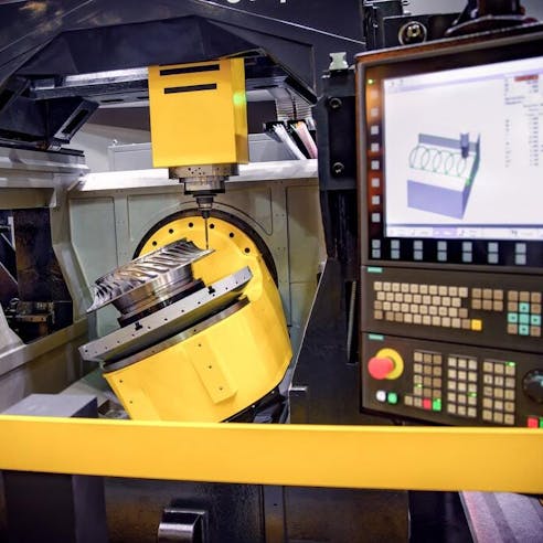 CNC milling machine cutting metal. Image Credit: Shutterstock.com/Andrey Armyagov