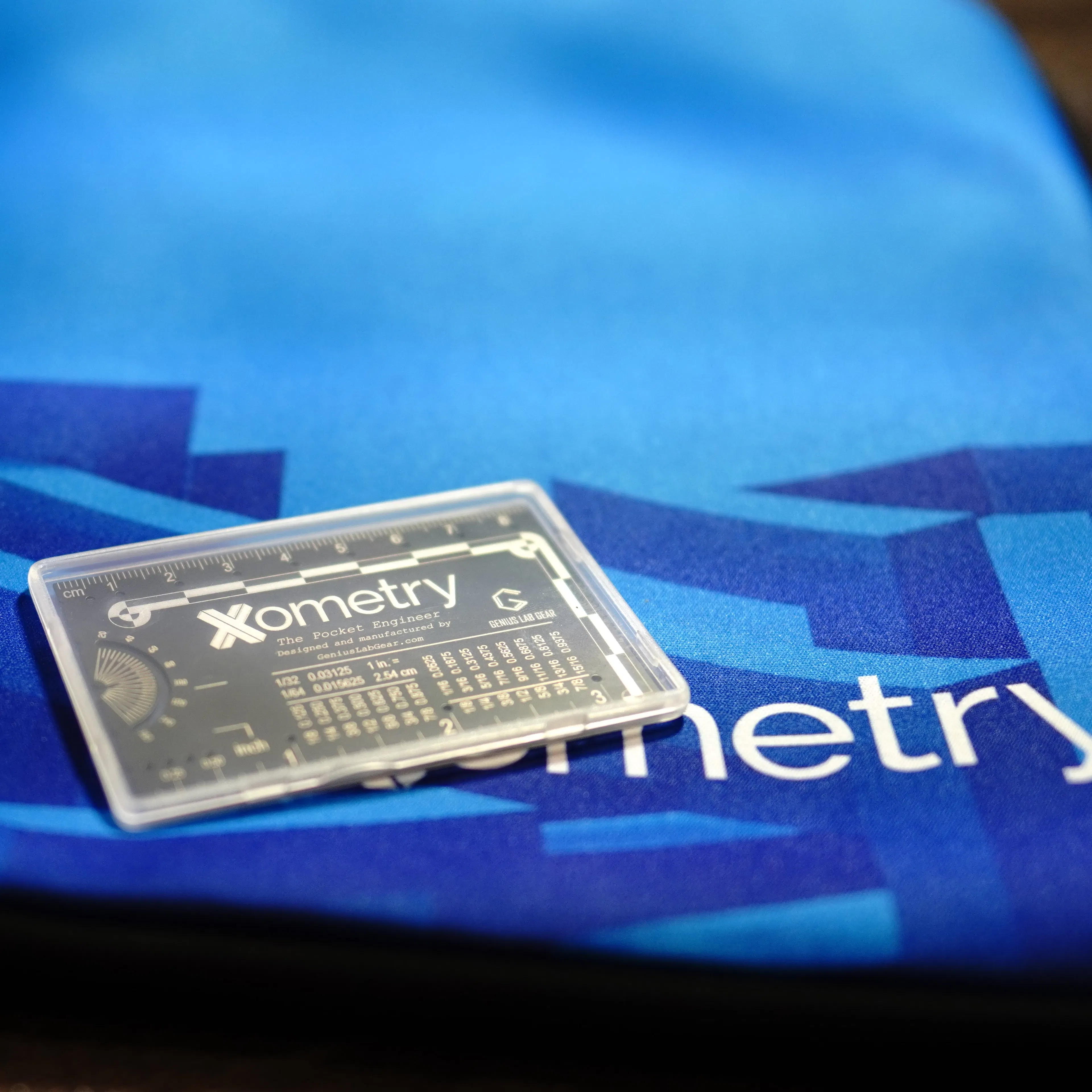 picture of engineering card on blue tablecloth