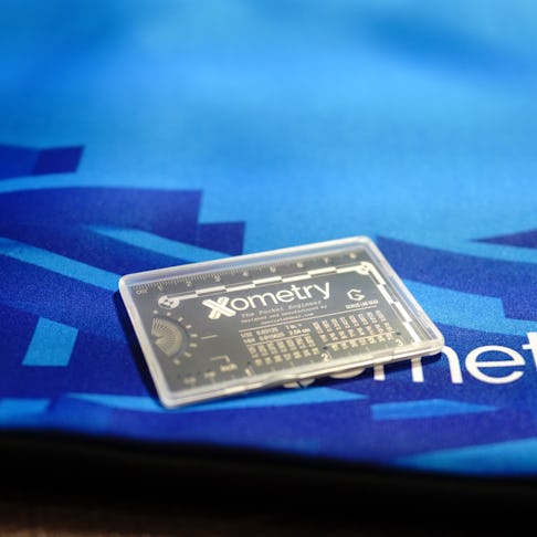 picture of engineering card on blue tablecloth