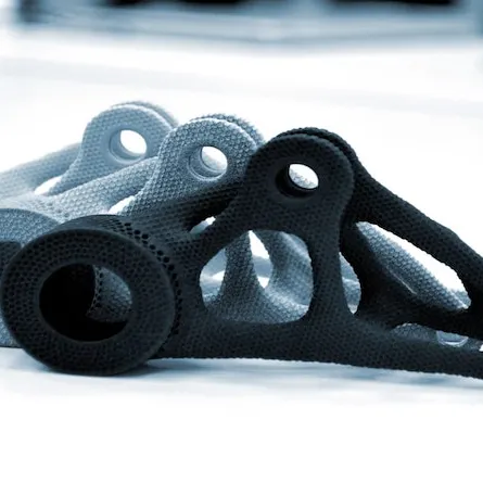 Models printed on 3D printer isolated on white background. Image Credit: Shutterstock.com/MarinaGrigorivna