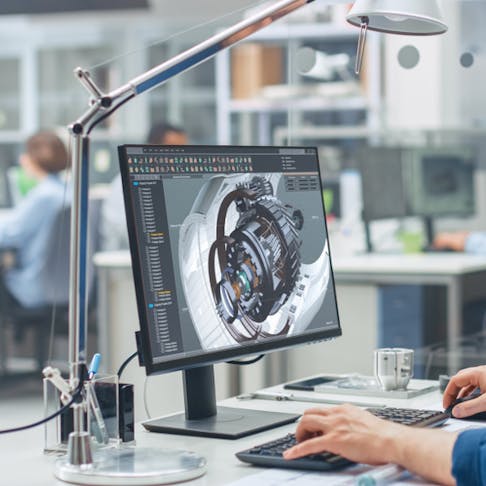 Engineer working on CAD software on desktop. Image Credit: Shutterstock.com/Gorodenkoff