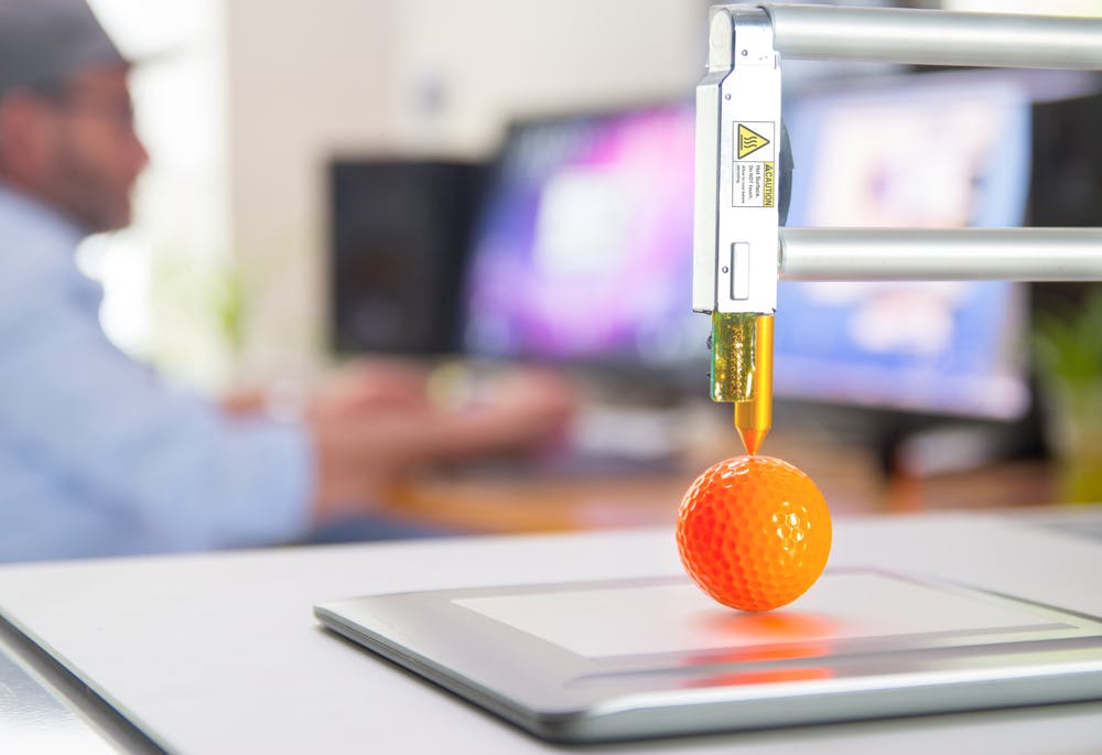 3D printed golf ball. Image Credit: Shutterstock.com/Audio und werbung