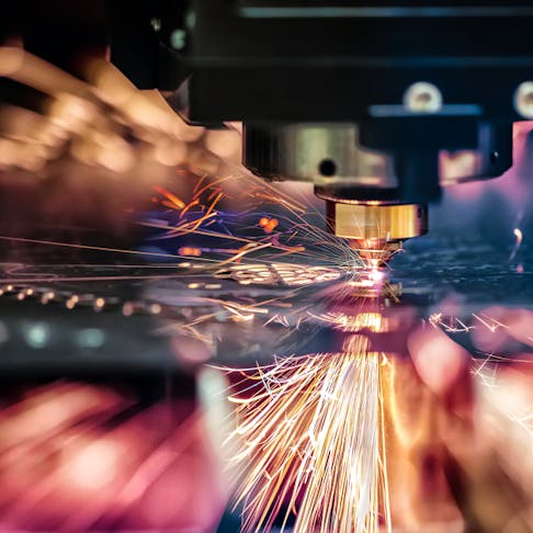 Laser cutting metal. Image Credit: Shutterstock.com/Andrei Armiagov