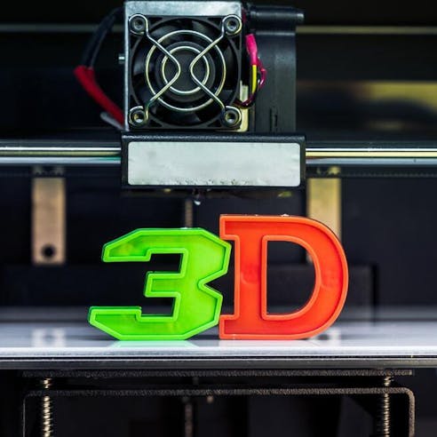 Green and red 3D printed letters. Image Credit: Shutterstock.com/FabrikaSimf