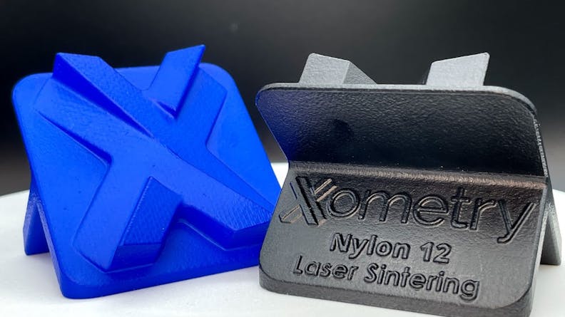 Vapor Smoothed SLS parts, Xometry logo