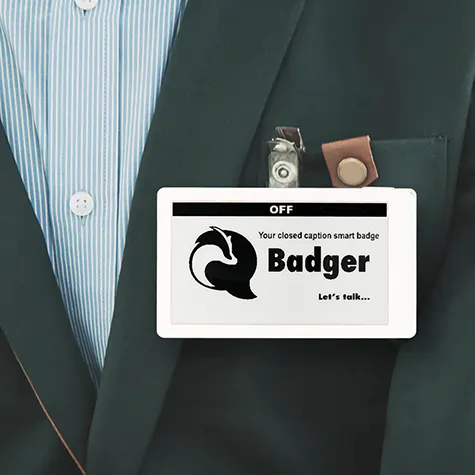 Satellite Displays badge on a shirt
