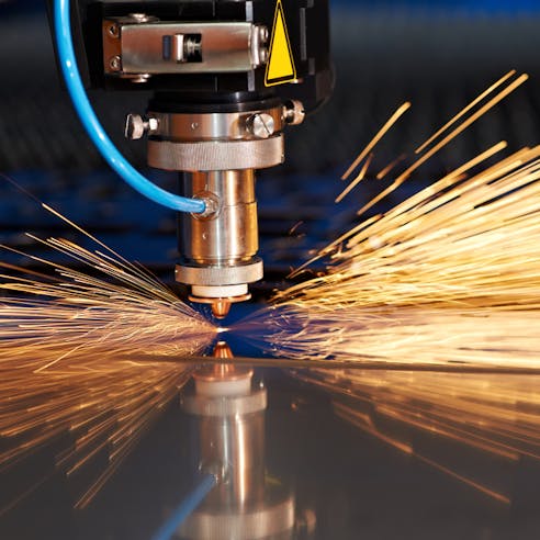 Industrial laser cutter. Image Credit: Shutterstock.com/Dmitry Kalinovsky