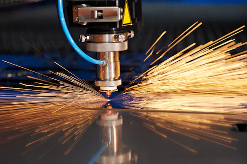 Industrial laser cutter. Image Credit: Shutterstock.com/Dmitry Kalinovsky