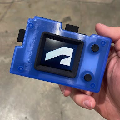 The Xometry produced smart badge at Autodesk University 2022