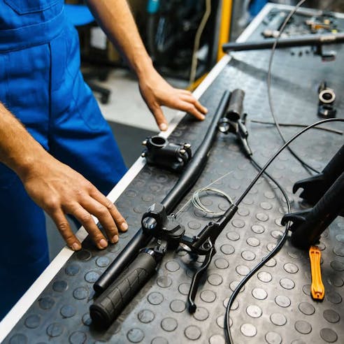 bicycle assembly handle bar on table