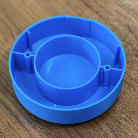 An example of plastic ribs in an blue injection molding part